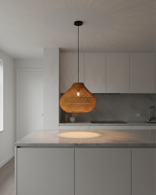Gourd-shaped handwoven rattan pendant with black canopy, D40 cm (15.75”) × H33 cm (12.99”). Warm E27 glow forms a starburst on the ceiling and a soft pool on the marble island; ideal for kitchens and dining.